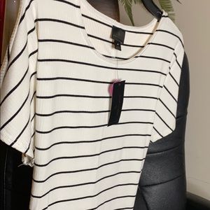 Whit blouse w/ white striped.